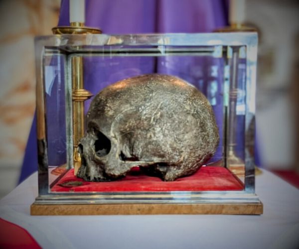 The skull of St Ambrose Barlow in a glass case on the altar of St Mary's, the Hidden Gem.